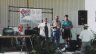 The Chairman and the entertainment giving away door prizes 